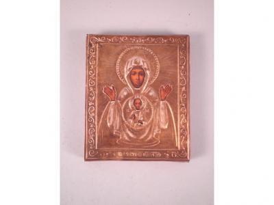 A Russian Icon with a white metal outer case decorated in the form of the