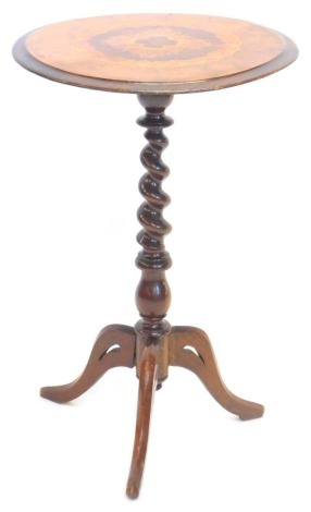 A Victorian walnut occasional table, the circular top decorated with marquetry scrolls in various timbers, on a spirally turned column and tripod base, 71cm high, 46cm dia.