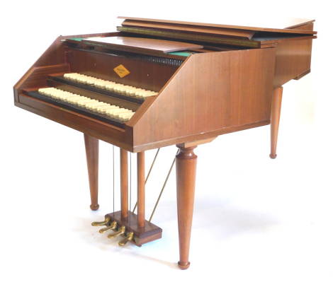 A William de Blaise of London K2 two-manual harpsichord, with two sets of ebony and simulated ivory keys, on turned tapering legs, 104cm wide, 207cm long, with tuning key, booklets, lock key and fitted canvas cover.