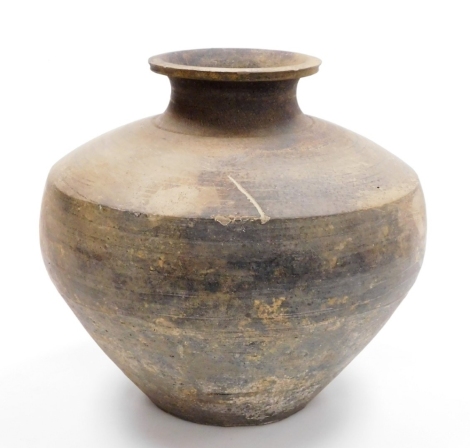 A Korean stoneware ovoid vase, with flared neck and shouldered body, 24.5cm high.