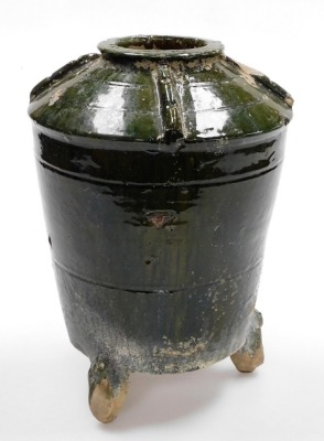 An Eastern Han style green glazed earthenware granary jar, of tapered shouldered design, raised on three feet, 31cm high. - 3