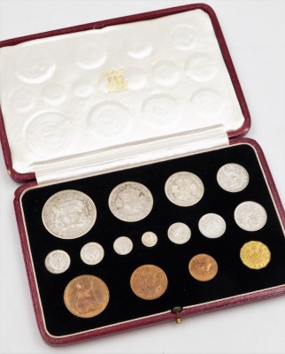 A George VI 1937 specimen coin set, containing fifteen coins from half crown to farthing, including Maundy money, in a gilt tooled red Morocco leather case.