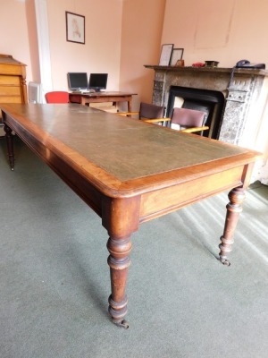 A Victorian mahogany library table, with tooled leather top, moulded frieze, turned legs and brass castors, 75cm high, 95cm wide, 245cm long. Please note this lot is located on site at the former offices of Messrs Stapleton & Son Solicitors, 1 Broad Stre - 4