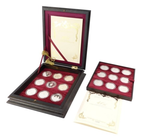 Royal Mint 40th Anniversary Coronation silver coin collection, in presentation case with certificates. (18)