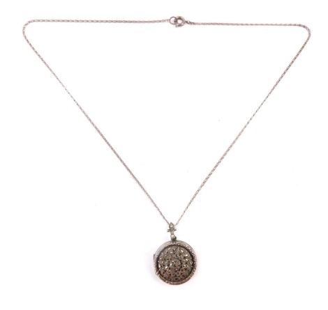 A silver and marcasite locket pendant and chain, the circular locket stamped DMP, with star marcasite design on a fine link silver chain, the pendant 3cm high, the chain 40cm long, 9.3g all in.