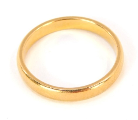 A 22ct gold wedding band, of plain design, ring size M½, 3.3g all in.