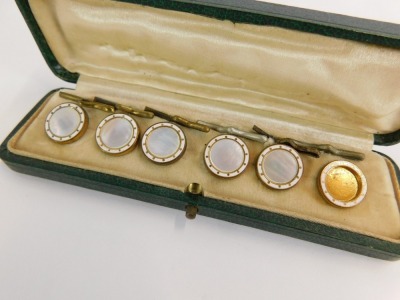 A Victorian cased collar set, with mother of pearl and white enamel detailing on a gilt finish, in a fitted case. (one AF). - 2