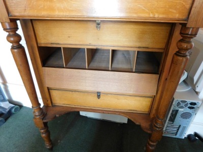 A Victorian oak clerk's desk, with galleried top with slope revealing desk top with the retailer's label for George Spademan, Cabinet Maker and Upholsterer, Stamford., over four fall flap drawer fronts, with Wellington locking action, opening to reveal pi - 4