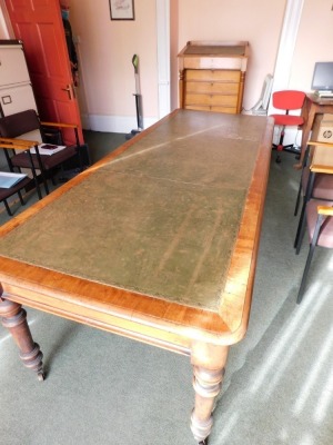 A Victorian mahogany library table, with tooled leather top, moulded frieze, turned legs and brass castors, 75cm high, 95cm wide, 245cm long. Please note this lot is located on site at the former offices of Messrs Stapleton & Son Solicitors, 1 Broad Stre - 2