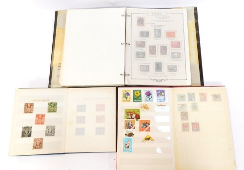 Three stamp albums, comprising a Great Britain stamp album c1940 to 1960, a red album containing European stamps c1940 to 1950, and a Malaysia and Singapore stamp album from 1960's and 1970's.