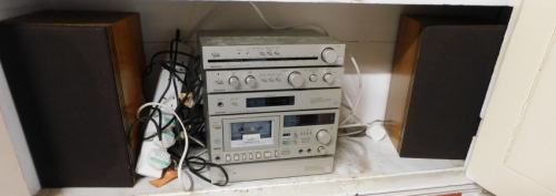 A Technics stacking system, with amplifiers, tuner, MO4 cassette player, Quartz Direct Drive Automatic turntable SL10, Pioneer TX608L stereo tuner, and Pioneer Stereo amplifier SA-706. Please note this lot is located on site at the former offices of Mess