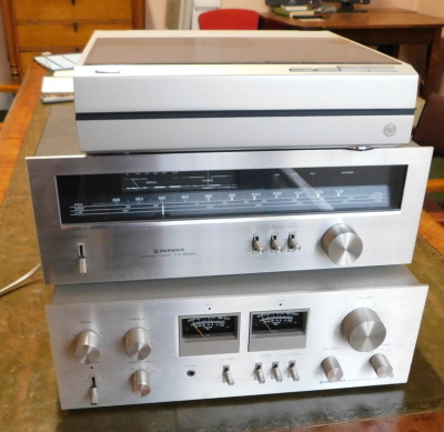 A Technics stacking system, with amplifiers, tuner, MO4 cassette player, Quartz Direct Drive Automatic turntable SL10, Pioneer TX608L stereo tuner, and Pioneer Stereo amplifier SA-706. Please note this lot is located on site at the former offices of Mess - 3