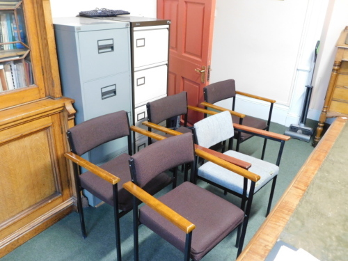 The residual furniture in the meeting room, consisting of 19thC oak drop leaf table, various teak and steel framed 1970's/1980's office chairs, and two steel filing cabinets. (a quantity) Please note this lot is located on site at the former offices of M