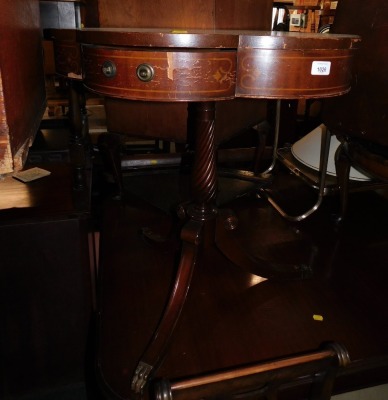 A reproduction mahogany six sided drum table, with spiral turned column.