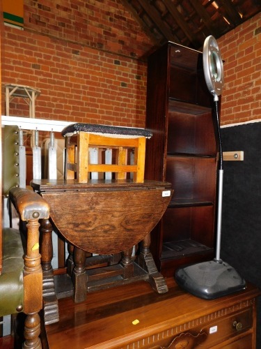 A drop leaf table, reading light, bookcase and stool. (4)