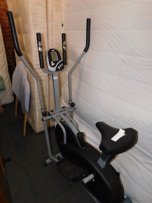 An XS Sports exercise bike and combined cross trainer.