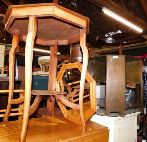 An early 20thC oak two tier end table, together with a mahogany centre table and a mirror. (3)