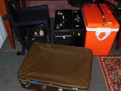 Suitcases, briefcases, office chair, etc. (a quantity)