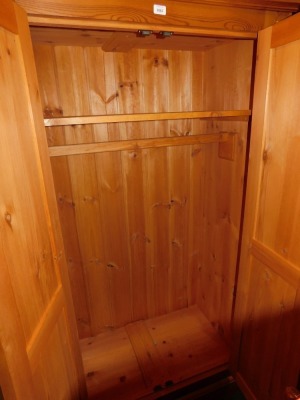 A pine double wardrobe, with shelf and hanging rail. - 2