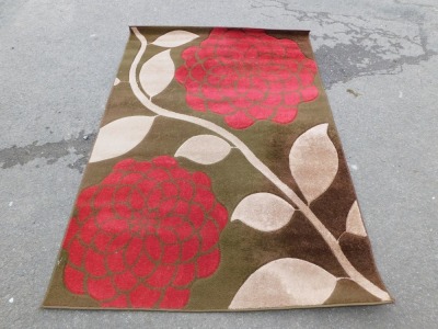 A modern rug, red rose style, 150cm x 210cm.