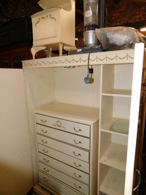 A cream painted French style wardrobe, chest of drawers and a bedside cabinet. (3)