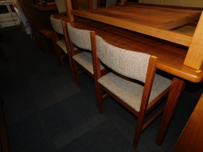 A late 20thC teak extending dining table, together with eight chairs. (9) - 2