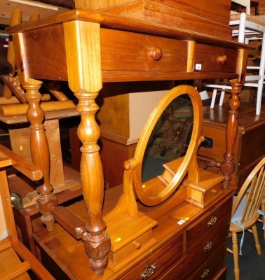 A pine dressing table with two drawers, and a swing mirror. (2)