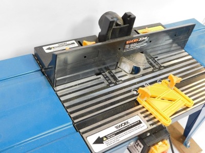 A Work Zone router table, with clamp attachment, lacking router. - 2