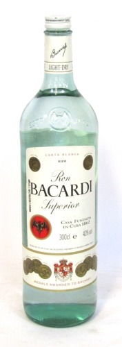 A Bacardi Superior 300cl bottle, 48cm high.