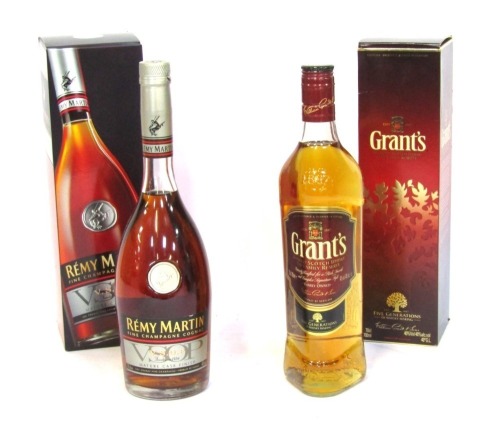 A Grants Family Reserve Scotch Whiskey 70cl bottle, and a Remy Martin Champagne Cognac, boxed. (2)