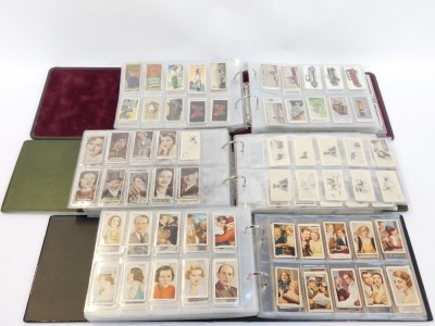 Three albums of cigarette tea and trade cards, Football Players, Vintage Cars, Franklins, Ogdens, Gallaghers, and others. - 2