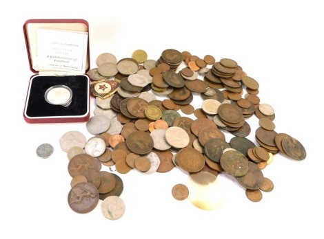 A group of coinage, including a silver proof £2 football coin 1996, a 1980 fifty pence piece, and a museum replica coin. (a quantity)