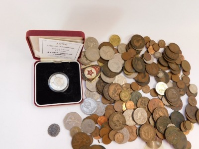 A group of coinage, including a silver proof £2 football coin 1996, a 1980 fifty pence piece, and a museum replica coin. (a quantity) - 2