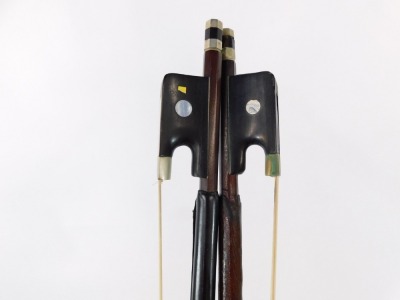 A German cello, possibly Saxony, with ebonised finish board, two bows, each in mother of pearl inlay to the front, a music stand and four cello music scores. - 7