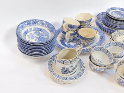 A group of blue and white wares, comprising Old Chelsea pattern cups and saucers, English Ironstone Old Willow pattern wares, etc. (a quantity) - 2