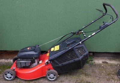 A Champion 40 petrol lawn mower.