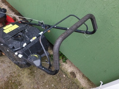 A Champion 40 petrol lawn mower. - 3