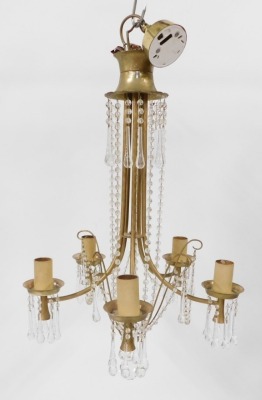 An early 20thC brass and crystal lustre drop five branch electrolier, 63cm high, 50cm wide.