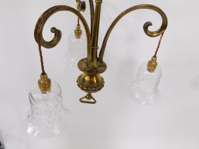 A brass three branch hanging chandelier, with chain drop, on stem and fluted bulbous centre, with floral cut glass bell shaped shades, 63cm high. - 2