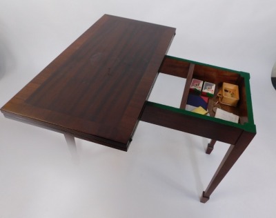 A Georgian style mahogany card table, the fold over top with reeded edge, enclosing a baize interior, raised on square tapering legs, and spade feet, 72cm high, 87cm wide, 44cm deep. - 3