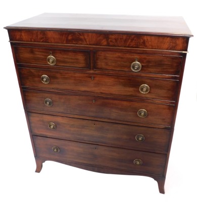 A George III mahogany secretaire chest of drawers, with a secret drawer opening to reveal a fitted interior with a writing slope, above two short over four long graduated drawers, raised on splayed feet, 124cm high, 110cm wide, 55cm deep. Provenance: Bou