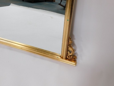 A Victorian style gilt framed oval mantel mirror, the arched top with foliate detailing, 106cm high, 140cm wide, 7cm deep. - 3