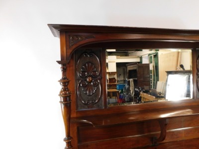 A Victorian Art Nouveau mahogany mirror back sideboard, the mirror backed top with floral panels, and single shelf with turned column supports, above two drawers and two doors, raised on turned feet, 197cm high, 152cm wide, 55cm deep. - 3