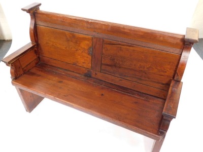 A Victorian pine church pew, the side painted with number 63, with two paneled back, 91cm high, 130cm wide, 52cm deep. - 2