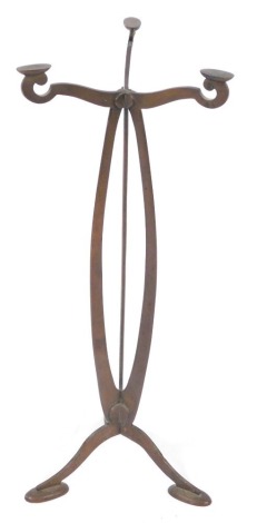 An Art Nouveau brass trivet stand, on tripod base, 60cm high.