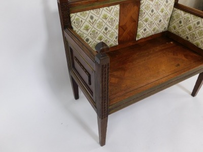 A Victorian oak and brass inlaid hall chair, with upholstered back and sides with carved panels and brass inlays, marquetry seat, on tapered, square legs, 92cm high, 96cm wide, 50cm deep. - 3