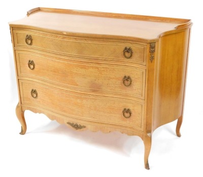 A French style mahogany bedroom suite, comprising dressing table and chest of drawers, the dressing table with long central drawer and two curved out panels, each with two drawers, with Neo Classical brass spandrels, 80cm high, 131cm wide, 42cm deep, the - 5