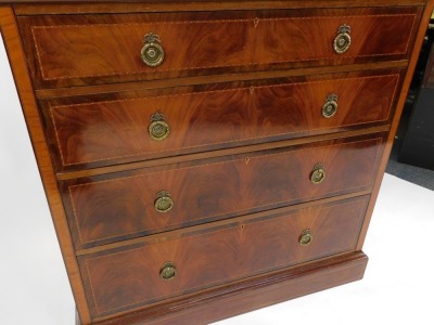 An Edwardian mahogany chest of four long graduated drawers, with herringbone and other banded inlay, raised on a plinth base, 113cm high, 114cm wide, 54cm deep. - 3