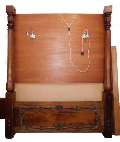 A Victorian and later mahogany four poster bed, with carved, octagonal posts.