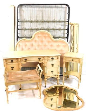 A French style composite cream finish bedroom suite, comprising a Canadian Craftsmanship dressing table, Arther Baetz bedside chest, dressing stool and single bed frame, the dressing table with arrangement of seven drawers, on castors, with central mirror